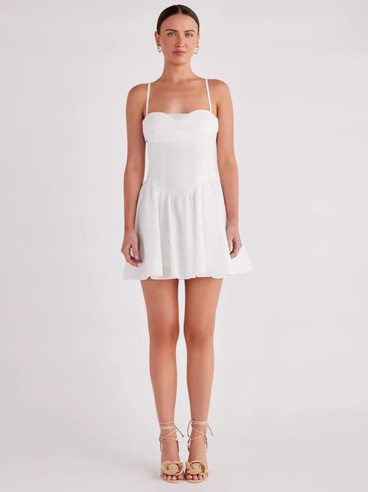 Image of a model wearing Dress. Productname: SNDYS Elsie Mini Dress in Off White colour by brand - SNDYS