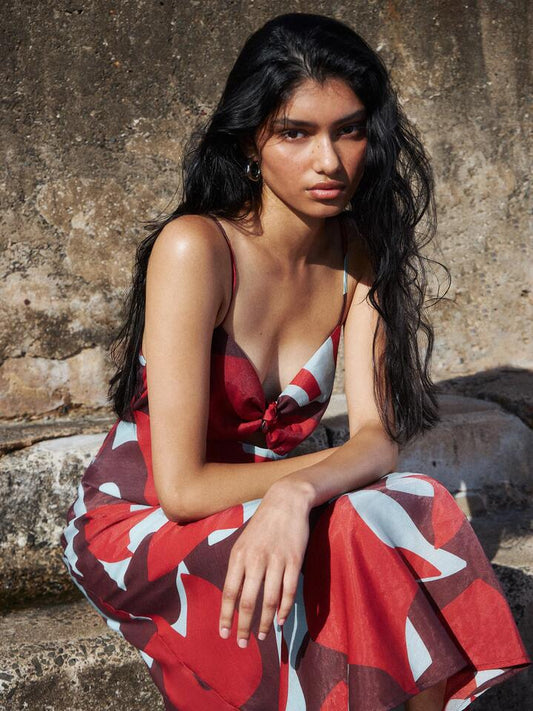 Image of a model wearing Dress. Productname: Lulu & Rose Kelsey Midi Dress in Majorca colour by brand - Lulu & Rose