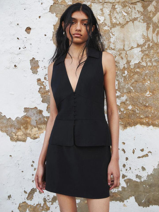 Image of a model wearing Tops. Productname: Lulu & Rose Meg Button Up Top in Black colour by brand - Lulu & Rose