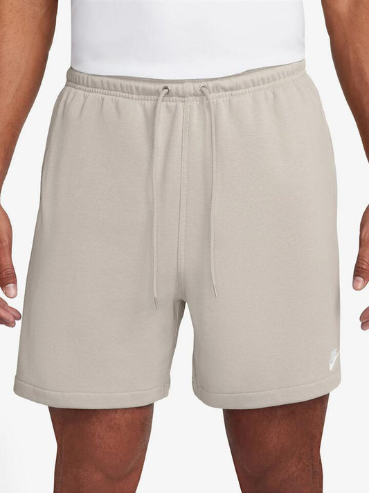 Image of a model wearing Shorts. Productname: Nike French Terry Flow Shorts in Lt Orewood Brown/White colour by brand - Nike