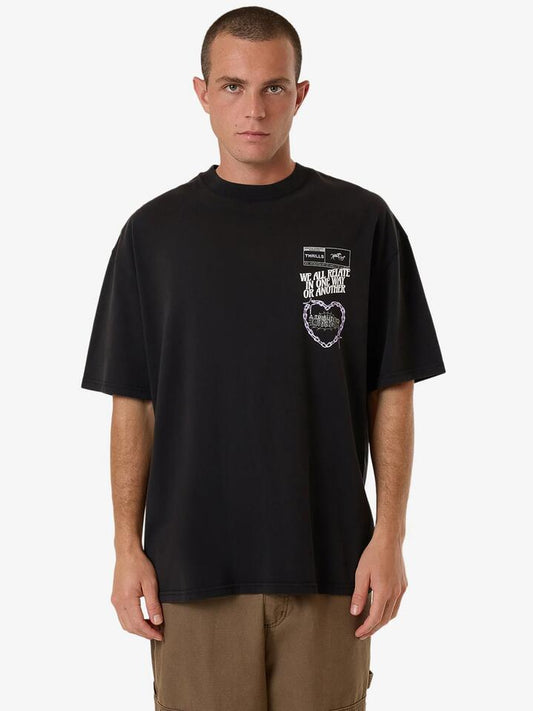 Image of a model wearing Tops. Productname: Thrills Chain Reaction Box Fit Oversized Tee in Faded Black colour by brand - Thrills