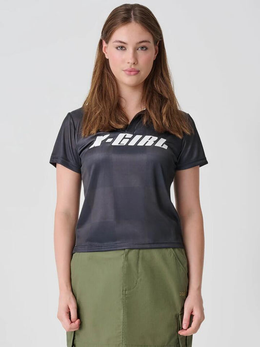 Image of a model wearing Tops. Productname: Xgirl Sport Polo Shirt in Black colour by brand - Xgirl