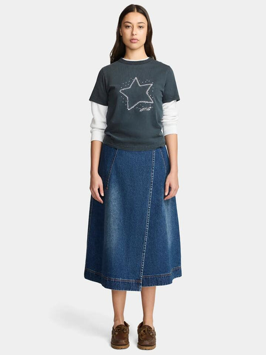 Image of a model wearing Skirts. Productname: Larriet Wrap Skirt in 70s Wash colour by brand - Larriet
