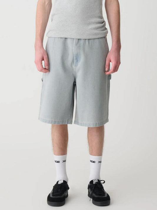 Image of a model wearing Denim. Productname: Xlarge Denim Work Short in Arctic Blue colour by brand - Xlarge