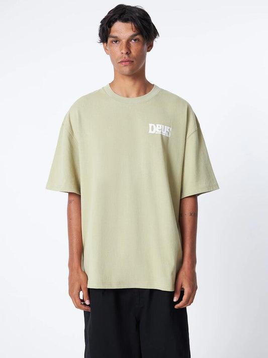 Image of a model wearing Tops. Productname: Deus Soundworm Tee in Sage colour by brand - Deus