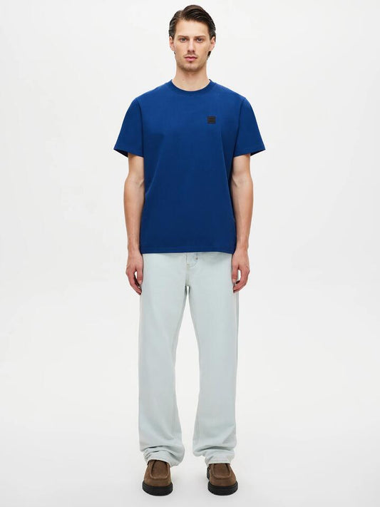 Image of a model wearing Denim. Productname: Neuw River Relaxed Fade in Light Vintage Indigo colour by brand - Neuw