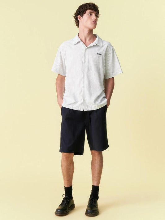 Image of a model wearing Shorts. Productname: Barney Cools Boxy Suit Short in Slate Stripe colour by brand - Barney Cools