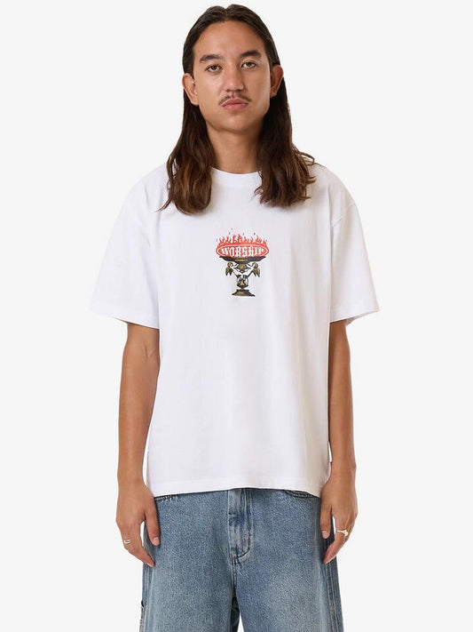 Image of a model wearing Tops. Productname: Worship Chalice Tee in White colour by brand - Worship