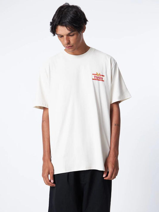 Image of a model wearing Tops. Productname: Thrills Never Stop Merch Fit Tee in Heritage White colour by brand - Thrills