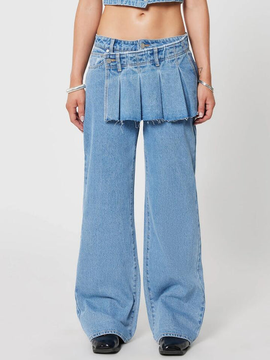 Image of a model wearing Denim. Productname: Abrand 95 Baggy Skean Gigi in Mid Blue colour by brand - Abrand