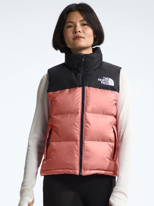 Image of a model wearing Tops. Productname: The North Face 1996 Retro Nuptse Vest in Light Mahogany colour by brand - The North Face