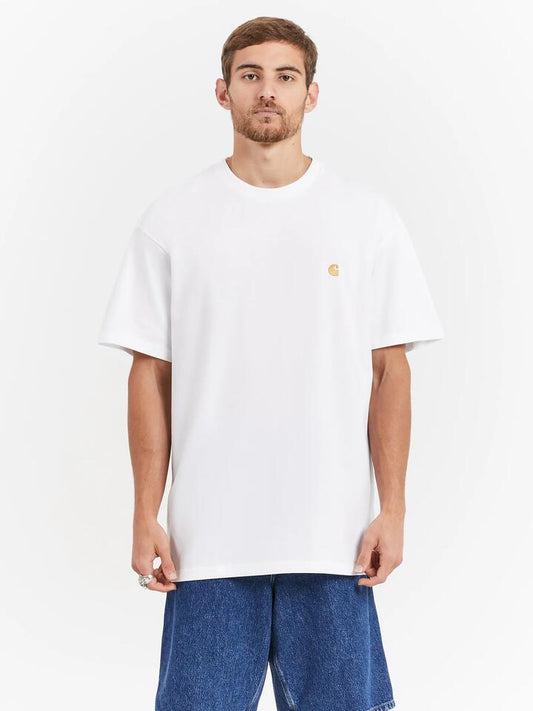 Image of a model wearing Tops. Productname: Carhartt Wip Chase T-Shirt in White / Gold colour by brand - Carhartt Wip