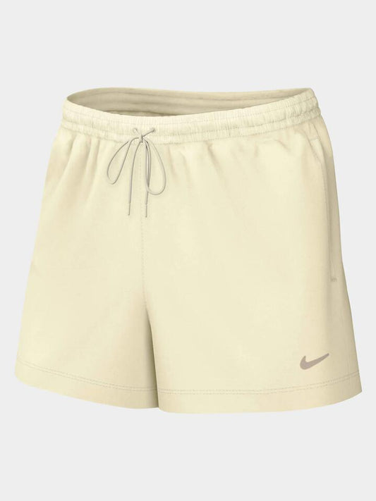 Image of a model wearing Shorts. Productname: Nike MR Woven Short in Ivory/Sanddrift/Lt Orewood Brn colour by brand - Nike