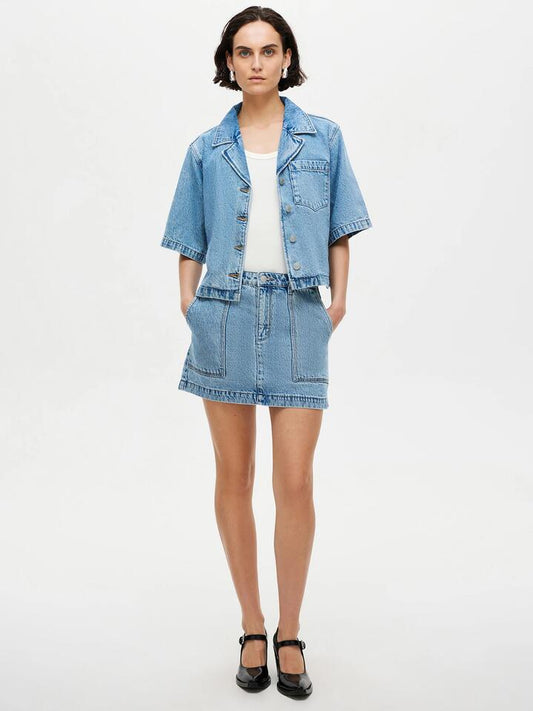 Image of a model wearing Skirts. Productname: Neuw Mercer Mini Skirt Radio in Light Vintage Indigo colour by brand - Neuw