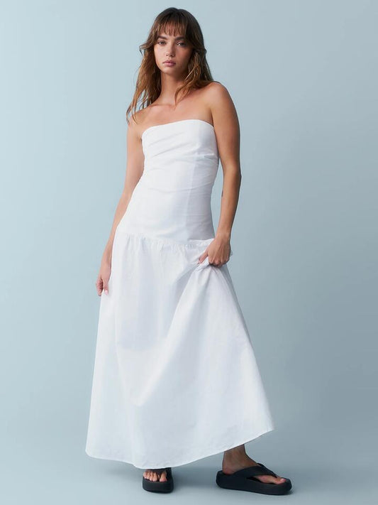 Image of a model wearing Dress. Productname: SNDYS Stella Maxi Dress in White colour by brand - SNDYS