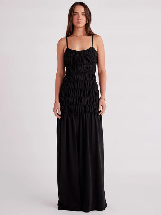 Image of a model wearing Dress. Productname: SNDYS Ingrid Maxi Dress in Black colour by brand - SNDYS