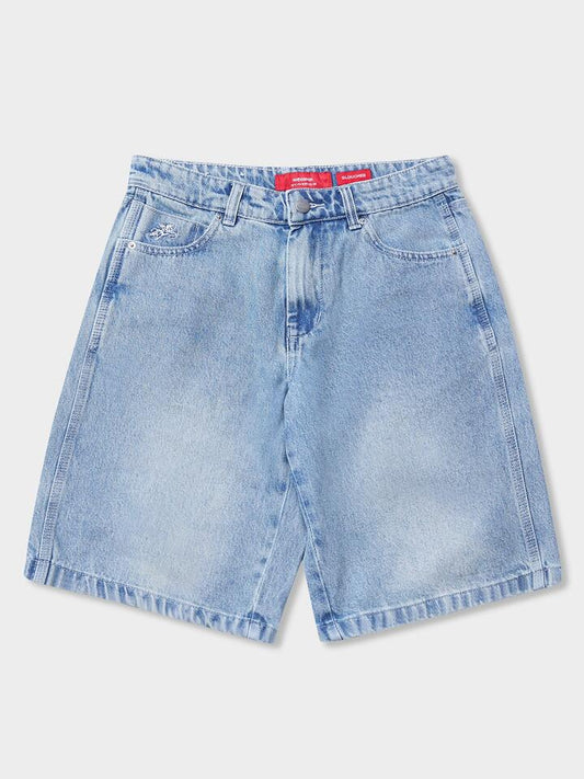 Image of a model wearing Shorts. Productname: Worship Sloucher Short in Dirty Trade Blue colour by brand - Worship