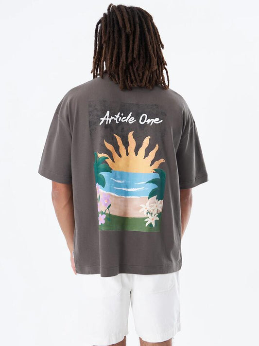 Image of a model wearing Tops. Productname: Article One Sunrise Boxy Tee in Washed Black colour by brand - Article One