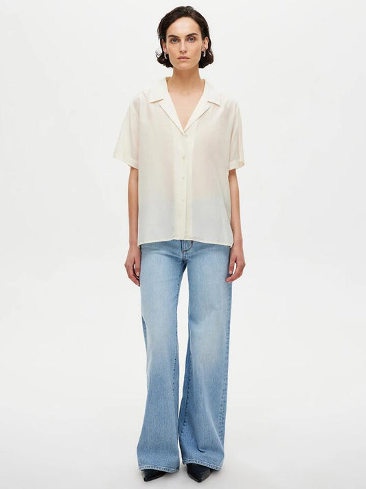 Image of a model wearing Denim. Productname: Neuw Eva Wide Aurora in Light Vintage Indigo colour by brand - Neuw