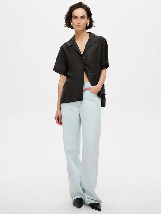 Image of a model wearing Tops. Productname: Neuw Sheer Resort Shirt in Black colour by brand - Neuw