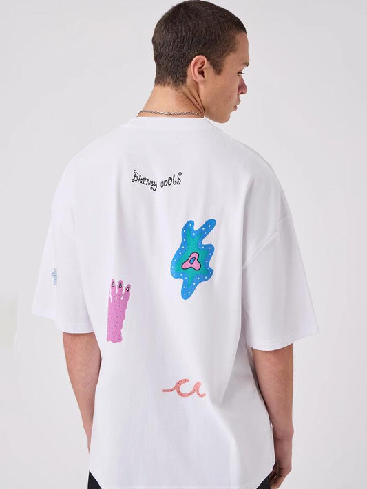 Image of a model wearing Tops. Productname: Barney Cools Planet Tee in White colour by brand - Barney Cools