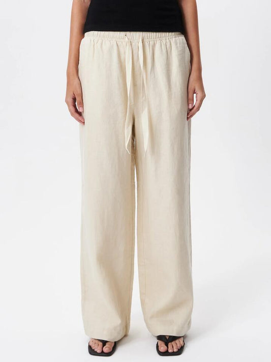 Image of a model wearing Pants. Productname: Lulu & Rose L&R Drawstring Pant in Natural colour by brand - Lulu & Rose