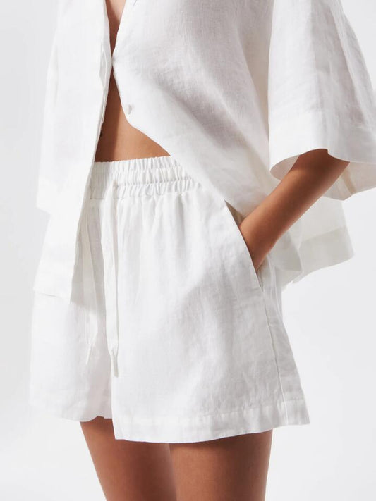 Image of a model wearing Shorts. Productname: Lulu & Rose L&R Relaxed Short in Off White colour by brand - Lulu & Rose