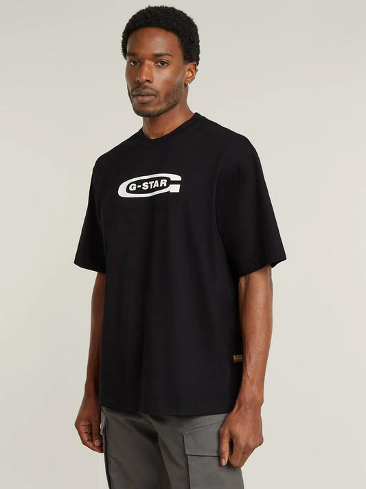 Image of a model wearing Tops. Productname: G-Star Old Skool Logo Boxy T-Shirt in Dark Black colour by brand - G-Star