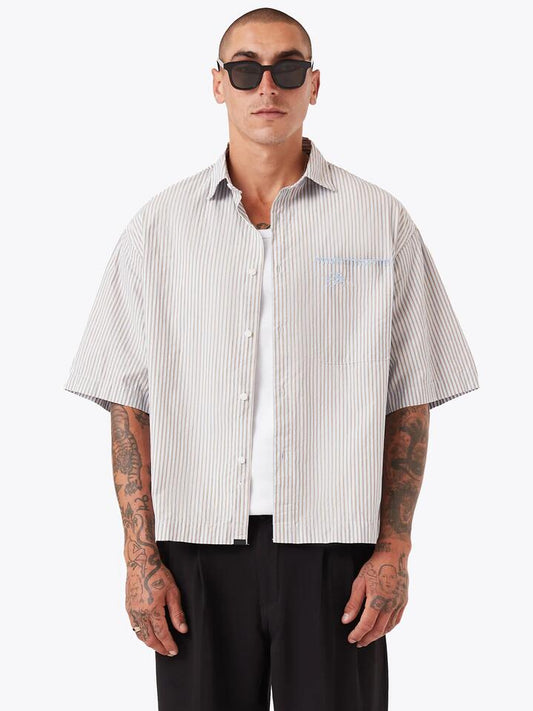 Image of a model wearing Tops. Productname: Zanerobe Box Crop Shirt in Brown/Sky Blue colour by brand - Zanerobe