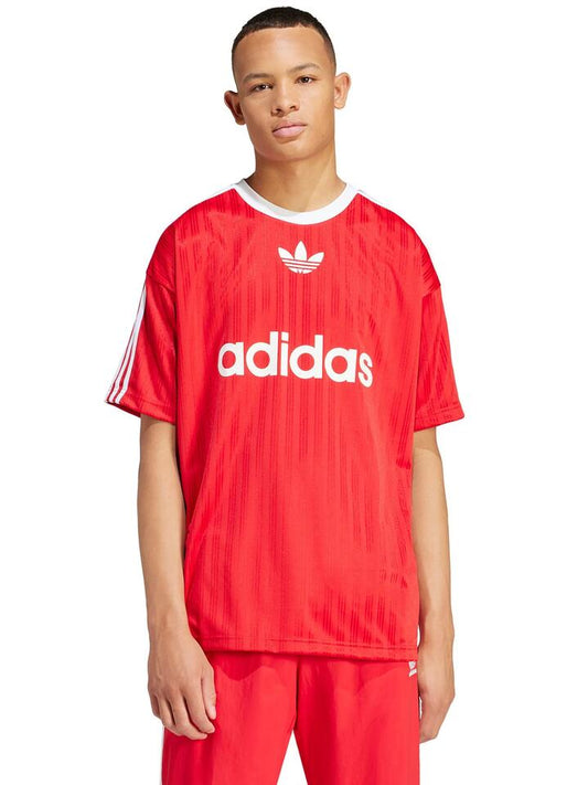 Image of a model wearing Tops. Productname: Adidas Adicolor Poly T-Shirt in Better Scarlet/White colour by brand - Adidas