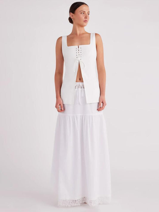Image of a model wearing Tops. Productname: SNDYS Osten Top in White colour by brand - SNDYS