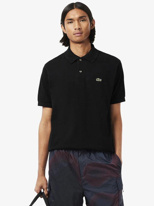 Image of a model wearing Tops. Productname: Lacoste L1212 Classic Polo - Black in Black colour by brand - Lacoste