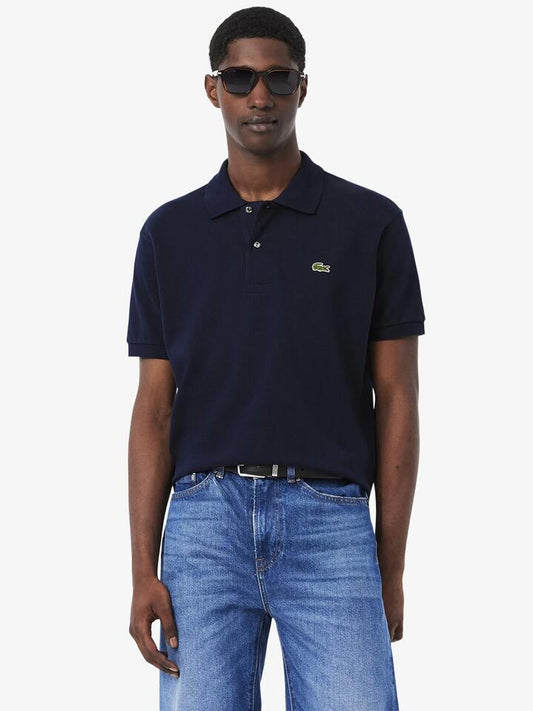 Image of a model wearing Tops. Productname: Lacoste L1212 Classic Polo in Navy Blue colour by brand - Lacoste