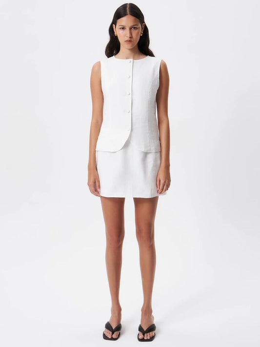 Image of a model wearing Skirts. Productname: Lulu & Rose Paige Mini Skirt in Off White colour by brand - Lulu & Rose