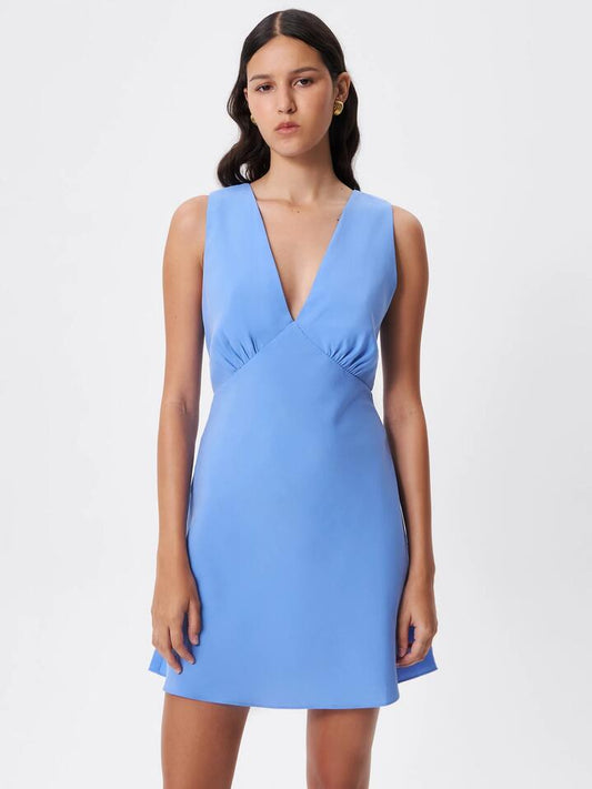 Image of a model wearing Dress. Productname: Lulu & Rose Meg Mini Dress in Cornflower colour by brand - Lulu & Rose
