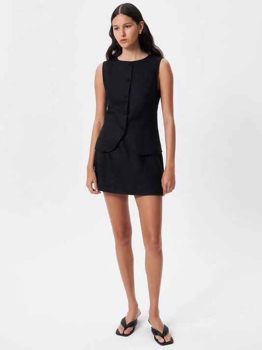 Image of a model wearing Skirts. Productname: Lulu & Rose Paige Mini Skirt in Black colour by brand - Lulu & Rose