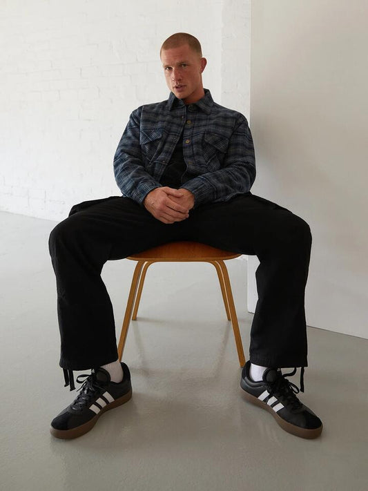 Image of a model wearing Outerwear. Productname: Article One Watson Overshirt in Navy Plaid colour by brand - Article One