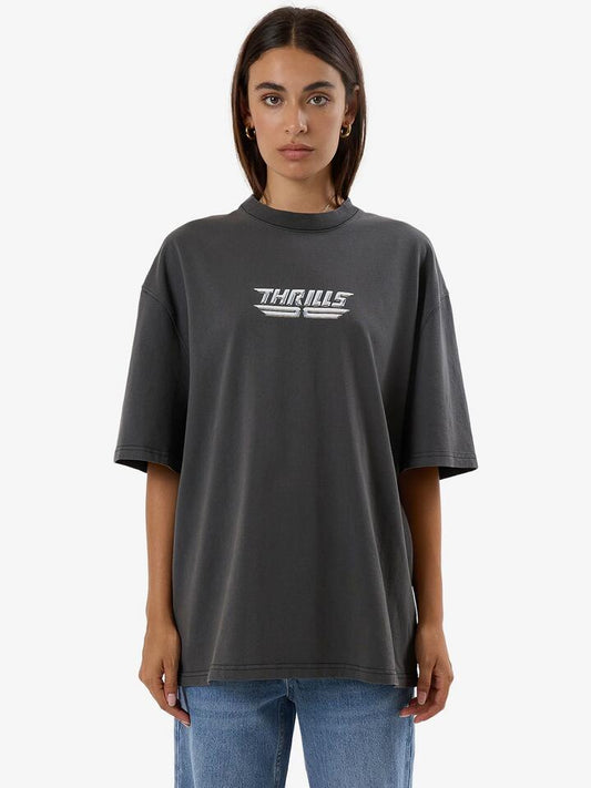 Image of a model wearing Tops. Productname: Thrills High Shine Oversized Tee in Merch Black colour by brand - Thrills