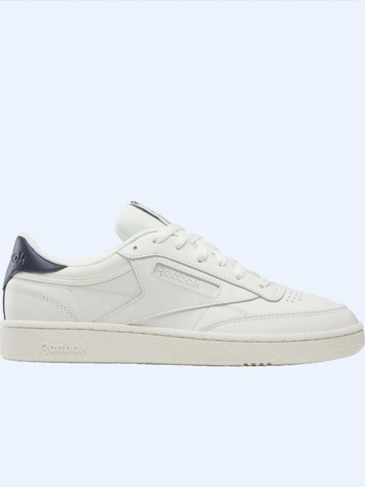 Image of Footwear. Productname: Reebok Club C 85 In Chalk & Grey in Chalk/Navy/Flint Grey Met colour by brand - Reebok