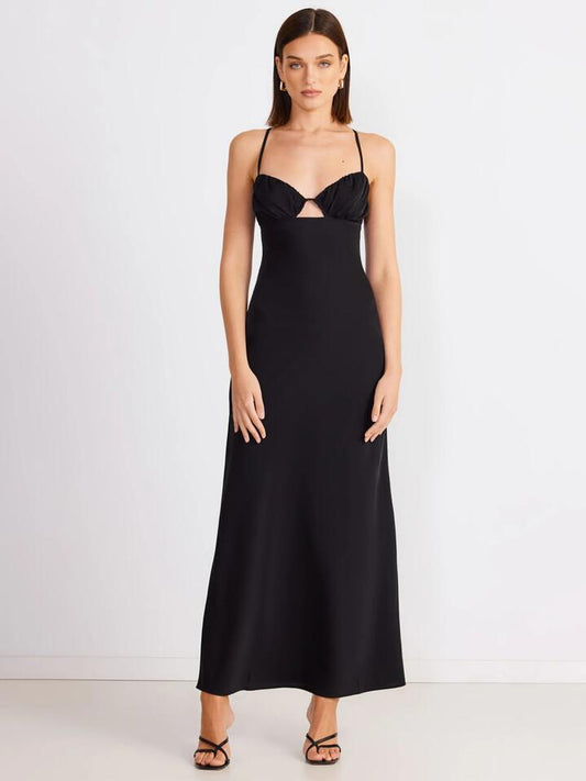 Image of a model wearing Dress. Productname: SNDYS Amalia Maxi Dress in Black colour by brand - SNDYS
