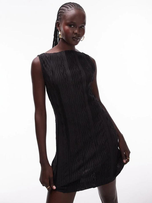 Image of a model wearing Dress. Productname: Topshop Crinkle Plisse Mini Dress in Black colour by brand - Topshop
