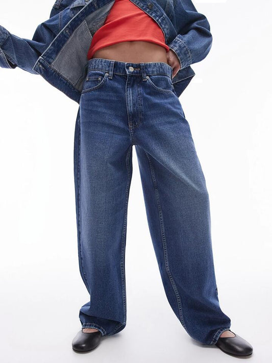 Image of a model wearing Denim. Productname: Topshop Gilmore Low Slung Boyfriend Jeans in RICH BLUE colour by brand - Topshop