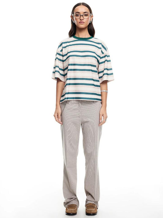 Image of a model wearing Tops. Productname: Lioness Emerging Tee in Greenstrip colour by brand - Lioness