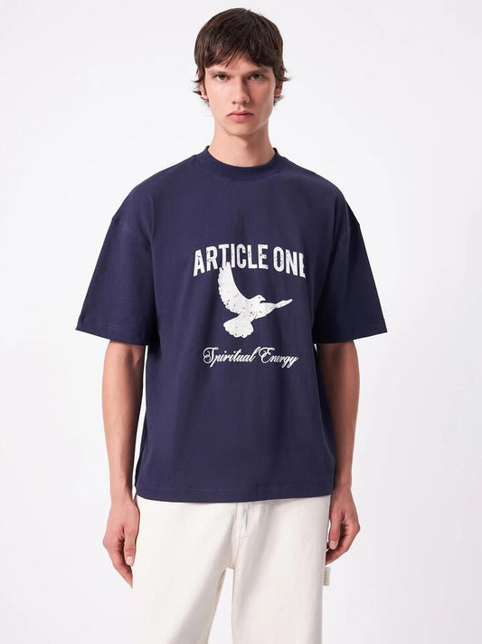 Image of a model wearing Tops. Productname: Article One Freedom Tee in Navy colour by brand - Article One