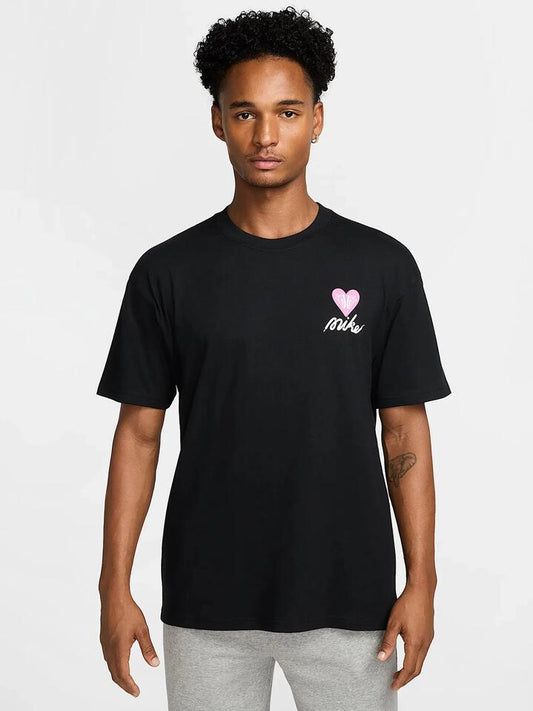 Image of a model wearing Tops. Productname: Nike Sportswear M90 T-Shirt in Black colour by brand - Nike