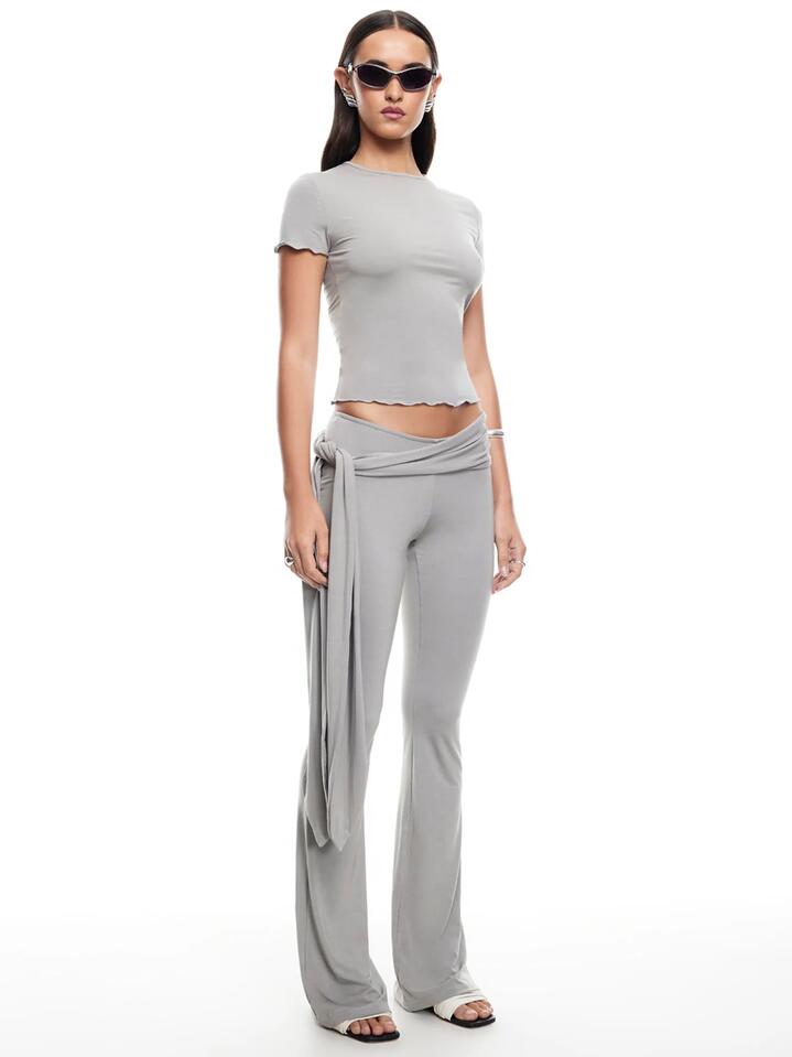 Image of a model wearing Pants. Productname: Lioness Butterfly Pant in Grey colour by brand - Lioness