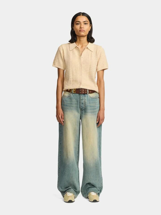 Image of a model wearing Denim. Productname: Larriet Wale Jean in Dirt Wash colour by brand - Larriet