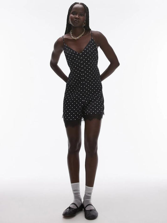 Image of a model wearing Dress. Productname: Topshop Lace Cami Playsuit in SPOT PRINT BLACK colour by brand - Topshop