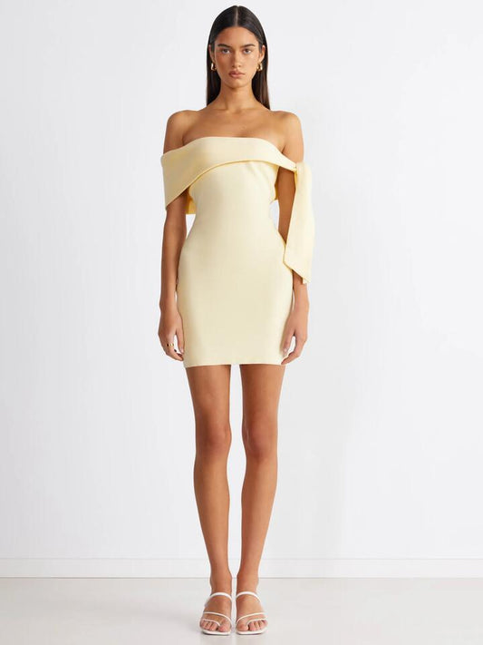 Image of a model wearing Dress. Productname: SNDYS Jaymes Mini Dress in PANNACOTTA colour by brand - SNDYS