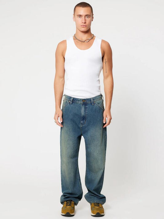 Image of a model wearing Denim. Productname: Abrand A6 Big Baggy Spike in TINT DARK BLUE colour by brand - Abrand